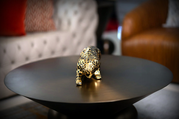 Brass-Leopard-Figurine-on-Coffee-Table