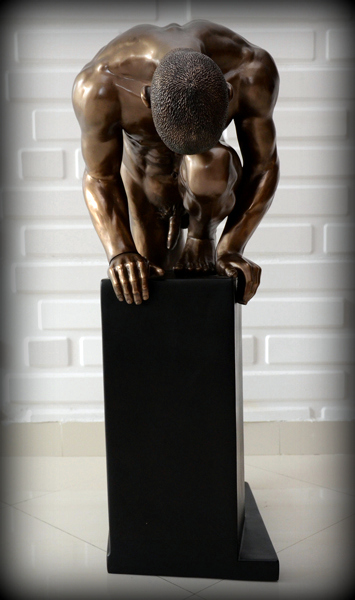 Male-Bronze-Figurine-Climbing-on-Pedestal